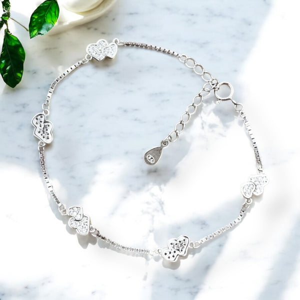 Sparkling Heart Charm Bracelet in Sterling Silver
