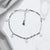 Dangling Floral Charm Bracelet in Sterling Silver