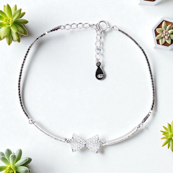 Sterling Silver Bow Charm Bracelet with CZ Accents
