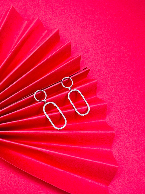 "Modern Loop: Geometric Diamond Drop Earrings"