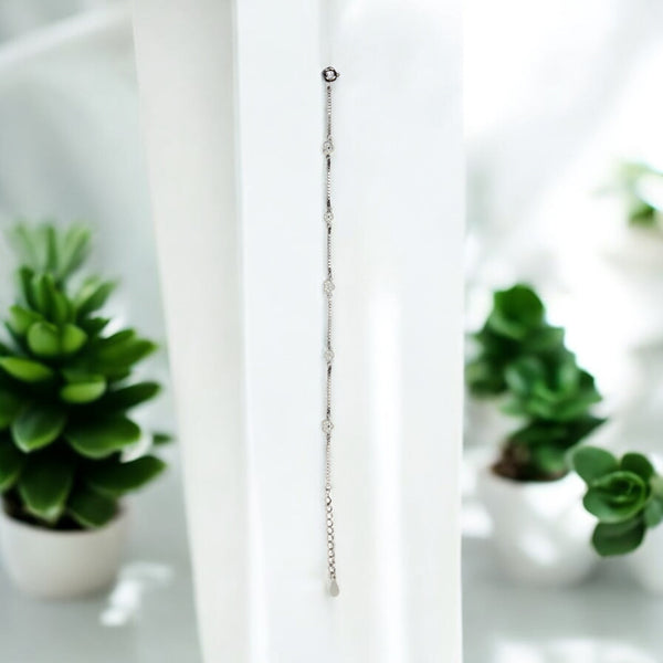 Delicate Floral Diamond Station Bracelet in White Gold