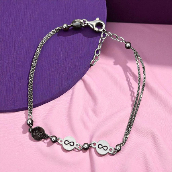 Twin Infinity Symbol Bracelet in Sleek Silver Finish