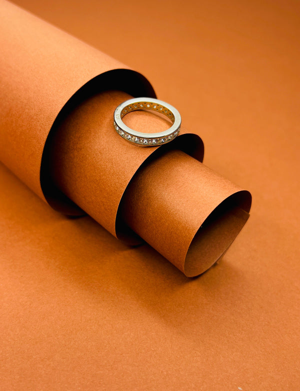 "Celeste Luxe: Diamond-Cut Eternity Band"